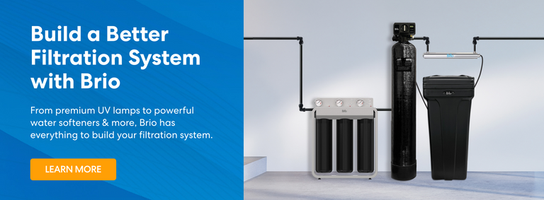 Promotional banner with text reading 'Build a Better Filtration System with Brio. From premium UV lamps to powerful water softeners & more, Brio has everything to build your filtration system.' Features an image of a connected filtration setup including a three-stage filter, a tall black tank, a UV lamp, and a brine tank. Includes an orange 'Learn More' button.